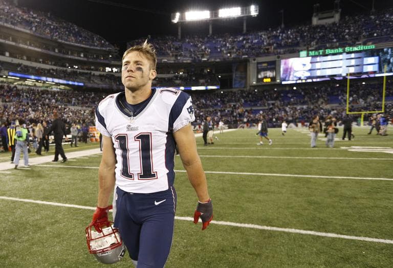 New England Patriots wide receiver Julian Edelman walks off the field after a 31-30 loss against the Ravens on Sunday. (AP)