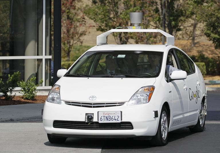 California Gov. Edmund G Brown Jr., front left, rides in a driverless car to a bill signing at Google headquarters in Mountain View, Calif., Tuesday, Sept. 25, 2012. The legislation will open the way for driverless cars in the state. Google, which has been developing autonomous car technology and lobbying for the legislation has a fleet of driverless cars that has logged more than 300,000 miles (482,780 kilometers) of self-driving on California roads. (AP)