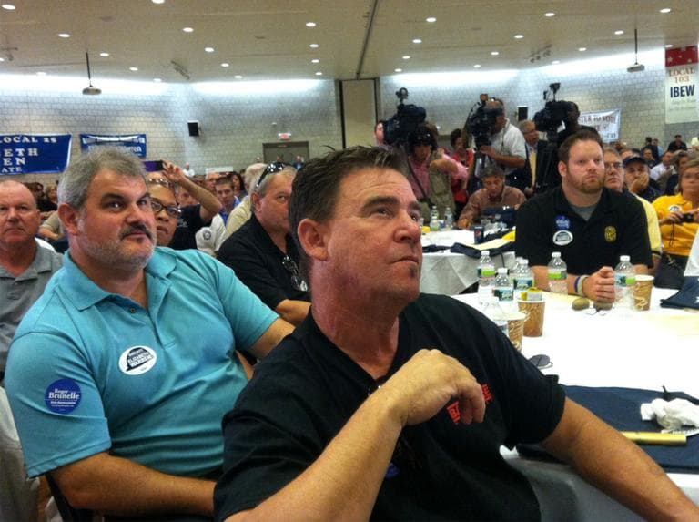 Union workers listen to Elizabeth Warren at a lunch in Dorchester this fall. (Fred Thys/WBUR)