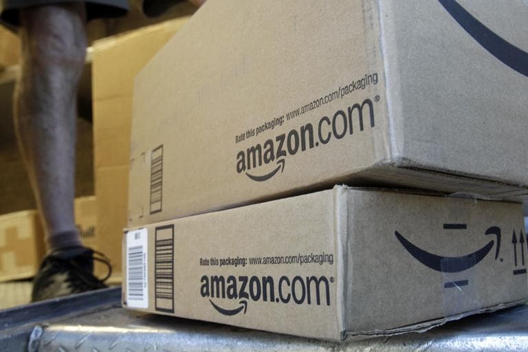 A United Parcel Service driver delivers packages from Amazon.com in Palo Alto, Calif. (AP)