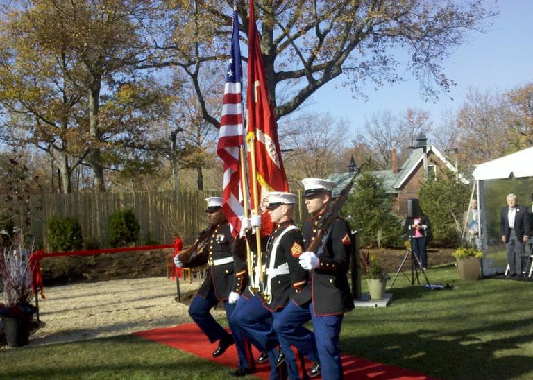 The 25th Marines Posting of Colors at a ceremony dedicating a new healing garden and sculpture for veterans and their families at the VA Medical Center's Fisher House Boston. (Lynn Jolicoeur/WBUR)
