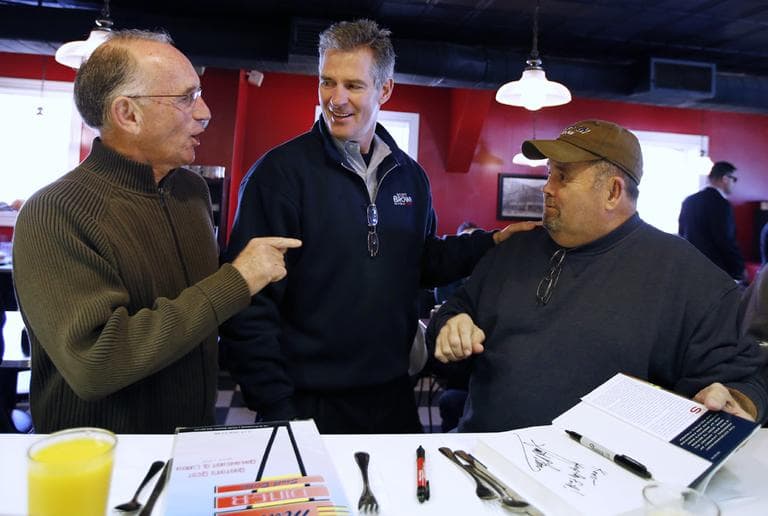 Sen. Scott Brown, center, speaks with constituents during a campaign stop at Mul's Diner in Boston on Sunday, Nov. 4. (Michael Dwyer/AP)