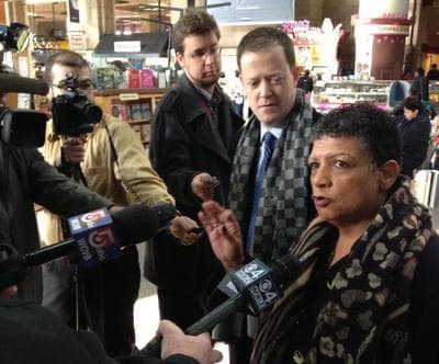 Incoming MBTA General Manager Beverly Scott talks to the media inside South Station Monday morning with Transportation Secretary Richard Davey. (Courtesy of MBTA)