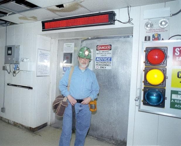 Author Steve Ettlinger stands at the entry of the mine shaft in Wyoming, where the rock used to make baking soda and baking powder comes from. He went 1,600 feet below ground and then drove in a Jeep for 30 minutes to reach the site. (TwinkieDeconstructed.com)