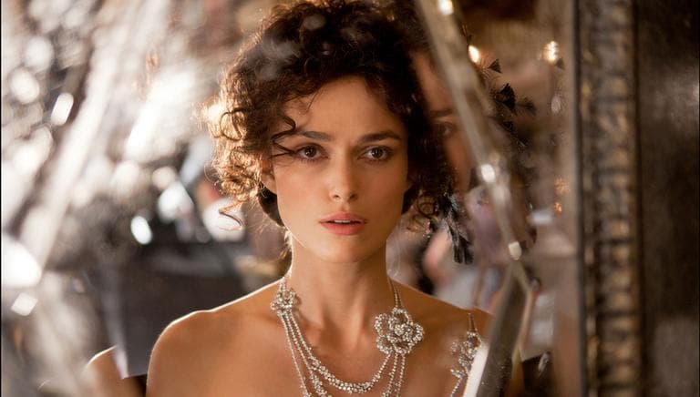 This publicity film image released by Focus Features shows Keira Knightley in a scene from "Anna Karenina." While “Pride &amp; Prejudice” and “Atonement” were fresh, lively takes for an age that finds costume drama stuffy, director Joe Wright planned a wild and possibly off-putting ride on “Anna Karenina,” confining most of the action to a dilapidated theater where the actors would perform in a stylized cinematic ballet without the usual grand sweep of period-drama locations. (AP)