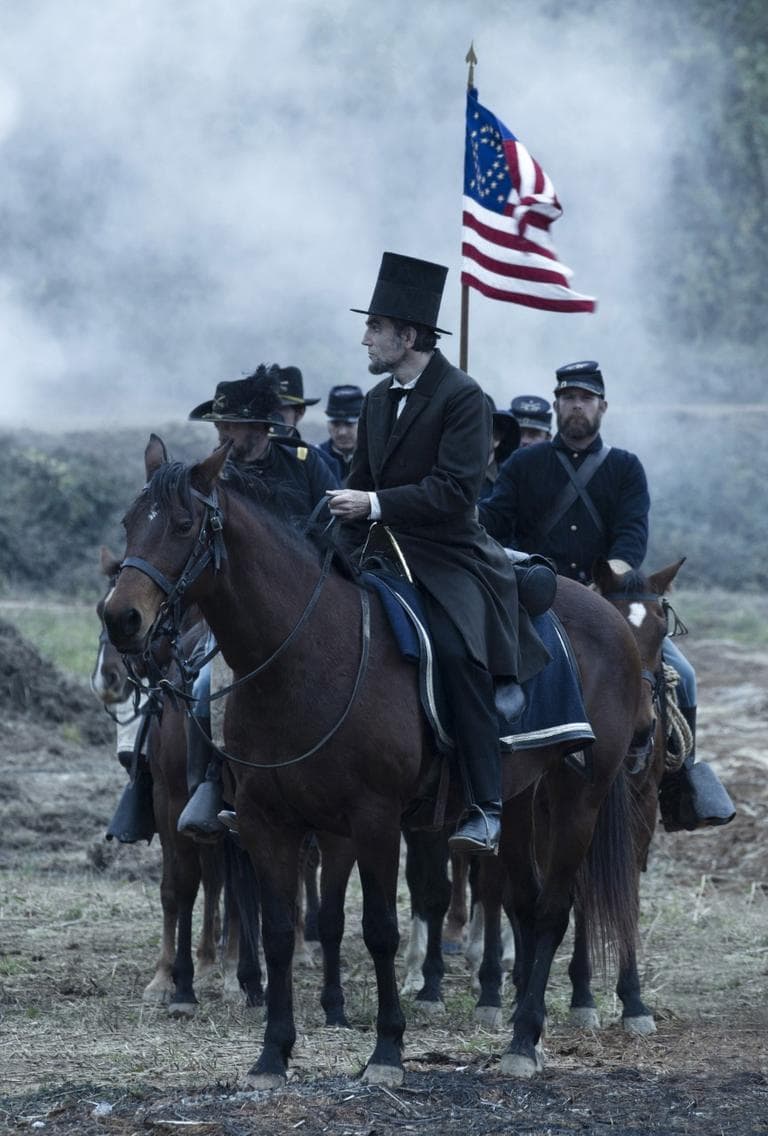 Daniel Day-Lewis, center, as President Abraham Lincoln, in a scene from director Steven Spielberg's drama "Lincoln," which opened nationwide on Nov. 16, 2012. (DreamWorks, Twentieth Century Fox, David James/AP)