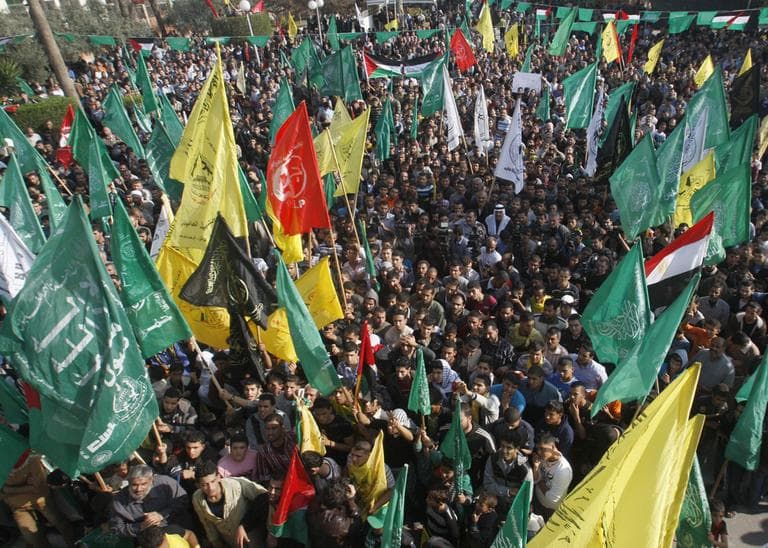 Palestinians celebrate the Israel-Hamas cease-fire in Gaza City, Thursday, Nov. 22, 2012. (Hatem Moussa/AP)