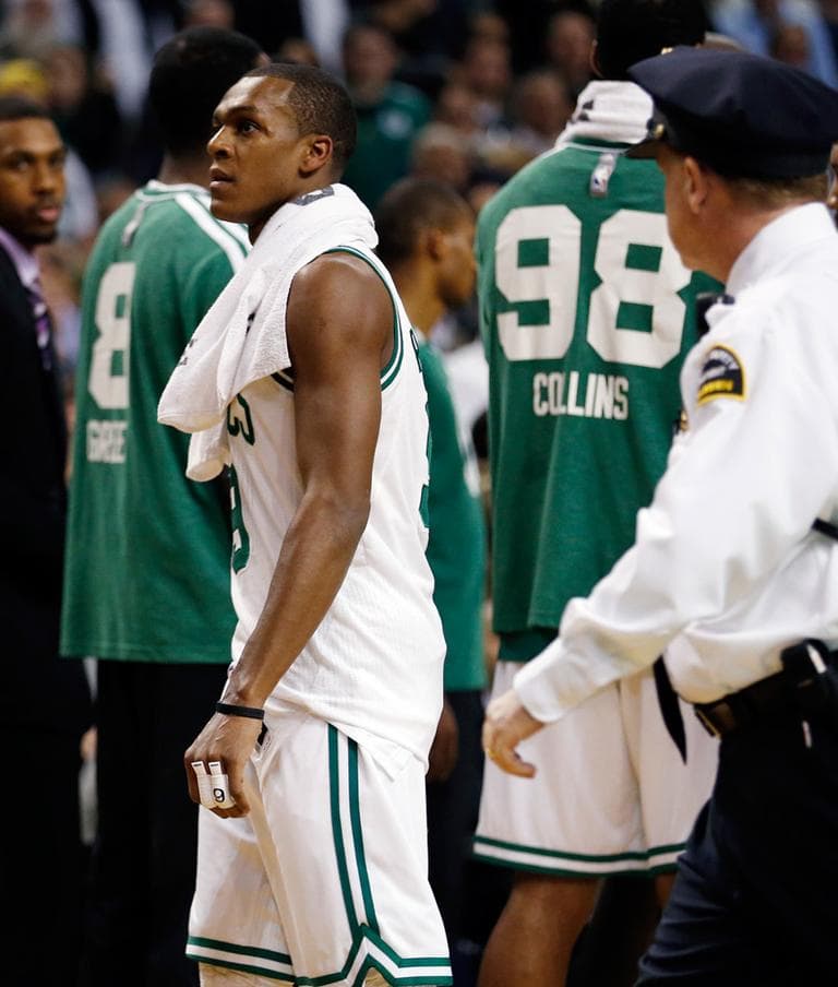 The Celtics' Rajon Rondo walks off the court after being ejected in the second quarter against the Brooklyn Nets on Wednesday night. (Michael Dwyer/AP)