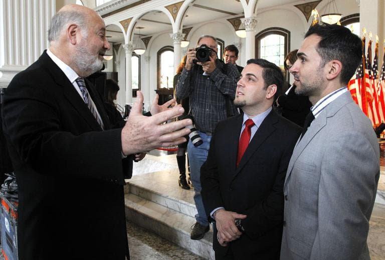 Actor Rob Reiner, left, congratulates Prop 8 plaintiffs: Jeff Zarrillo, middle, with partner Paul Katami, after a federal appeals court declared California's same-sex marriage ban to be unconstitutional in February 2012. It is one of the cases the Supreme Court could decide to take up on Friday.(AP/Damian Dovarganes)
