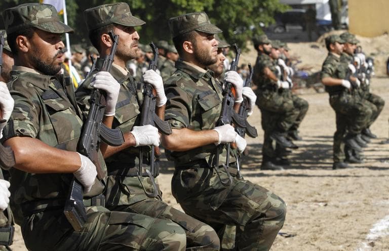 Members of Hamas' Palestinian National Security personnel march during a graduation ceremony in Gaza City on Sunday. (Hatem Moussa/AP)
