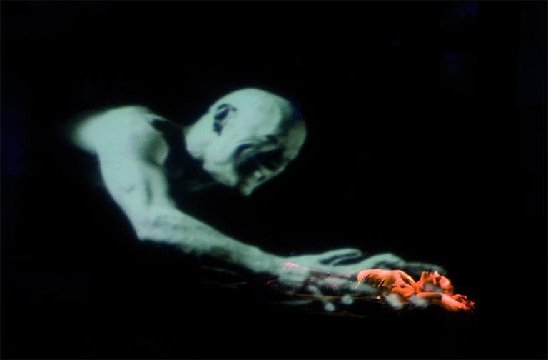 Belle ( Bénédicte Décary) haunted by a Demon (Peter James ). (Yves Renaud/ArtsEmerson)