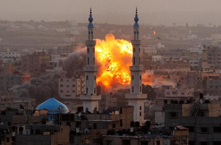 Smoke rises during an explosion from an Israeli forces strike in Gaza City. Israel bombarded the Hamas-ruled Gaza Strip with nearly 200 airstrikes widening an assault on Gaza rocket operations by militants to include the prime minister's headquarters, a police compound and a vast network of smuggling tunnels. Nov. 17, 2012. (AP Photo/Hatem Moussa, File)