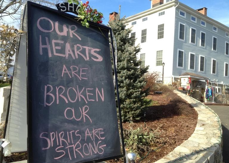 A condolence sign sits in downtown Sandy Hook, Conn., on Saturday, Dec. 15, 2012. (Allen Breed/AP)