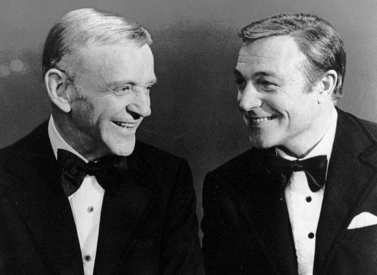 FredAstaire, left, and GeneKelly talk during MGM's musical extravaganza "That's Entertainment" Part II in this 1976 handout photo. (AP)