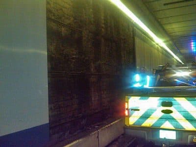 An empty space marks the location of a 4-by-9-foot panel that fell from the wall of Boston's Callahan Tunnel Friday night. (Courtesy MassDOT)