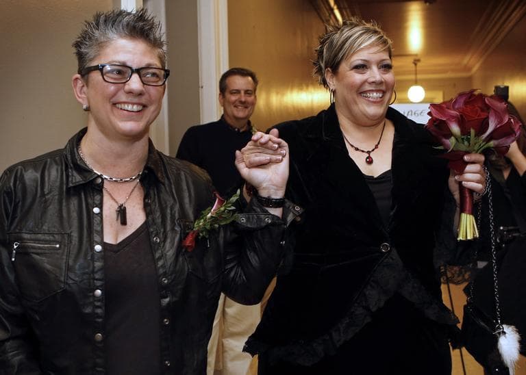 Donna Galluzzo, left, and Lisa Gorney leave the City Clerk's office after obtaining their marriage license, early Saturday, Dec. 29, 2012, at City Hall in Portland, Maine. (Robert F. Bukaty/AP)