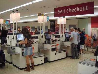 Theft is common at self-checkout machines, because the customer is also the cashier. (Flickr/pinadd)
