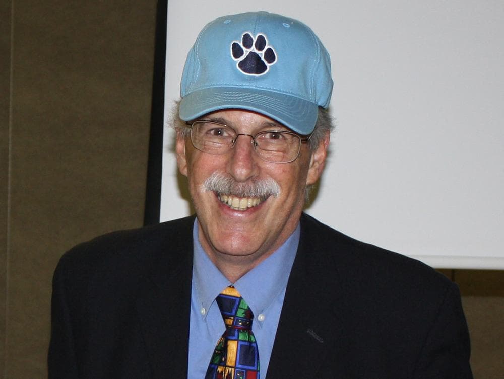 Nobel Prize-winning economist Peter Diamond wearing Pioneer Charter School of Science hat in Everett, Mass. (Deborah Becker/WBUR) 