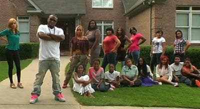 Rapper Shawty Lo is pictured with his 11 children and their 10 mothers in a short video promoting the planned Oxygen TV show "All My Babies' Mamas." (screenshot)