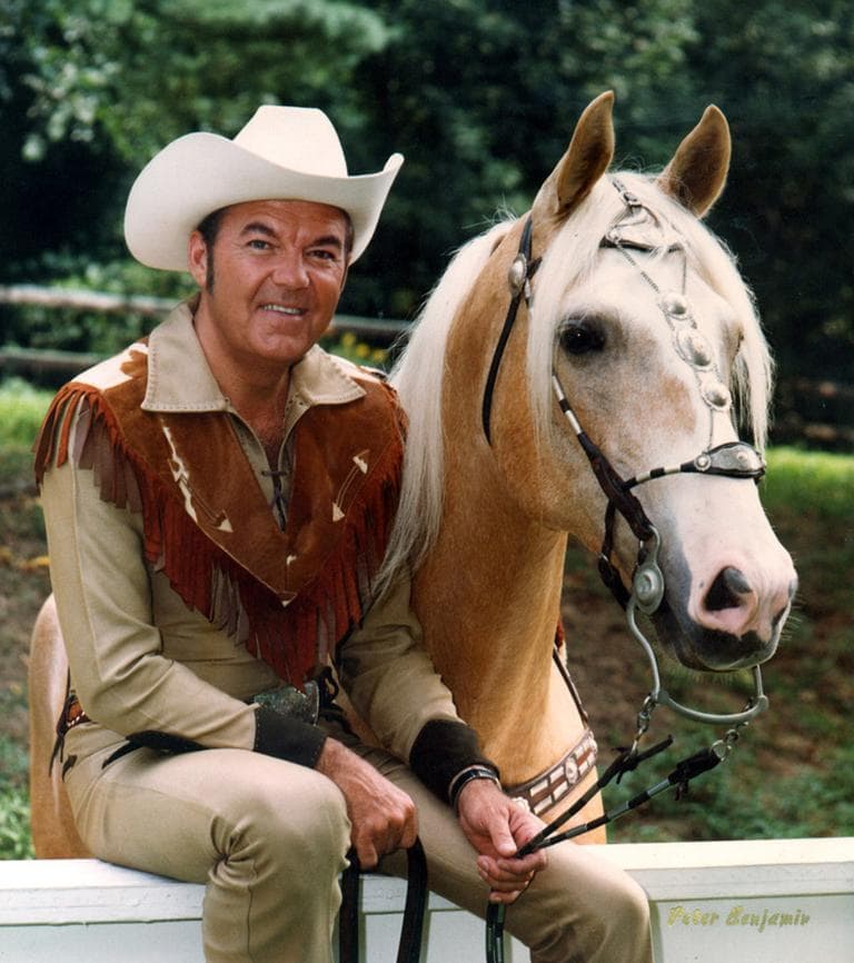 In this 1972 photo provided by Rex Trailer Productions &amp; Digital Freeway, Rex Trailer poses with his horse in Boston. (Peter Benjamin/AP)