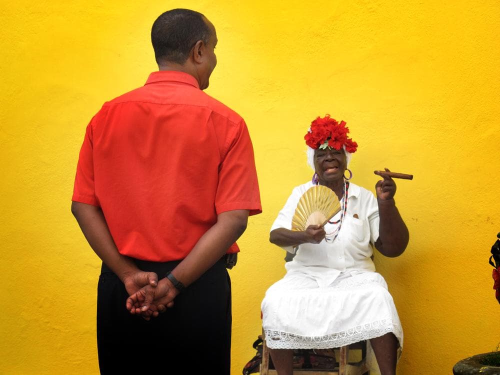 Cuban women dress in Colonial costume for tourists in Plaza de la Catedral. After I taking this picture this woman chased me down and pretty much demanded to be paid. I learned that's the deal with street artists in Havana, too. They play, you pay.