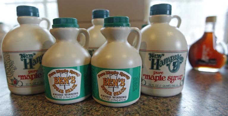 A variety of pure maple syrup containers are displayed at Ben's Sugar Shack in Temple, N.H., in February 2012. (Charles Krupa/AP)