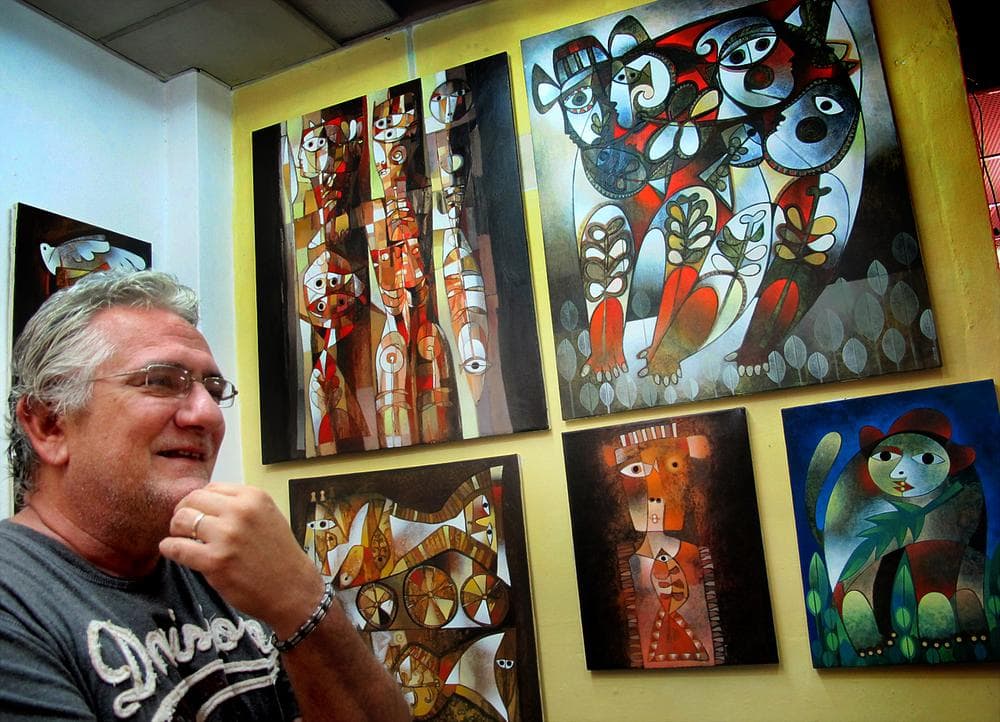 Painter Orestes Gaulhiac in his home studio. (Andrea Shea/WBUR)