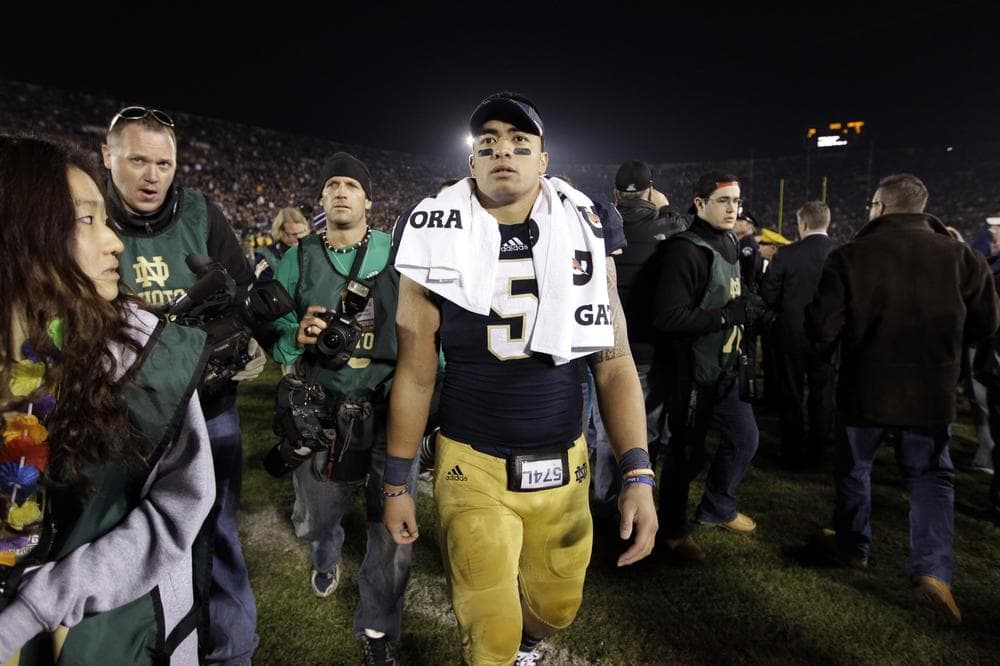 Manti Te'o survived the crush of media during Notre Dame's title run.  Will he fare as well with the hecklers he's likely to encounter in the NFL?  (AP/Michael Conroy)