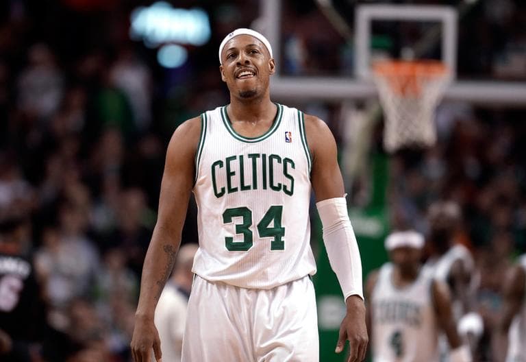 Boston Celtics forward Paul Pierce smiles as the Celtics take the lead in the second overtime against the Miami Heat in an NBA basketball game in Boston, Sunday, Jan. 27, 2013. The Celtics won 100-98. (AP Photo/Steven Senne)
