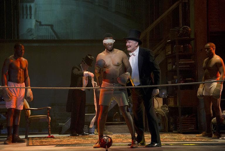 Teagle F. Bougere as the "Invisible Man" is egged on by Edward James Hyland. (T. Charles Erickson)