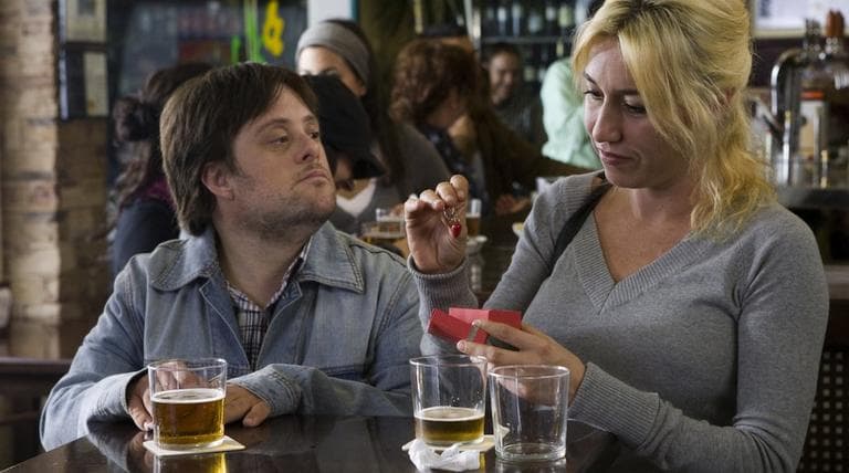 Daniel (Pablo Pineda) presents a gift to Laura (Lola Dueñas) in "Me, Too." (Courtesy of Olive Films)