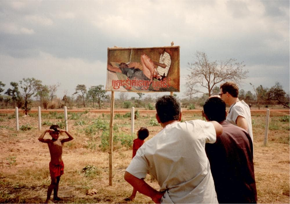 One of many posters created by Goldfeld and placed at the exits of a  Cambodian village to remind people the dangers of landmines in the area. (Courtesy Anne Goldfeld/Global Health Committee)