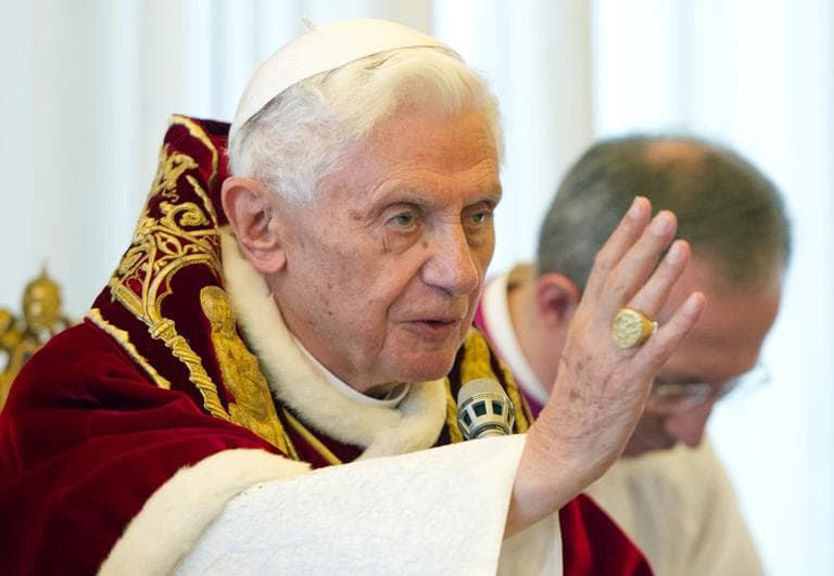 In this photo provided by the Vatican newspaper L'Osservatore Romano, Pope Benedict XVI delivers his blessing at the end of a meeting of Vatican cardinals, at the Vatican, Monday, Feb. 11, 2013. Benedict XVI announced Monday that he would resign Feb. 28 - the first pontiff to do so in nearly 600 years. (L'Osservatore Romano via AP)