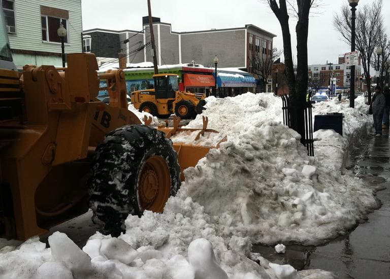 Snow removal in Eggleston on Monday. (Delores Handy/WBUR) 