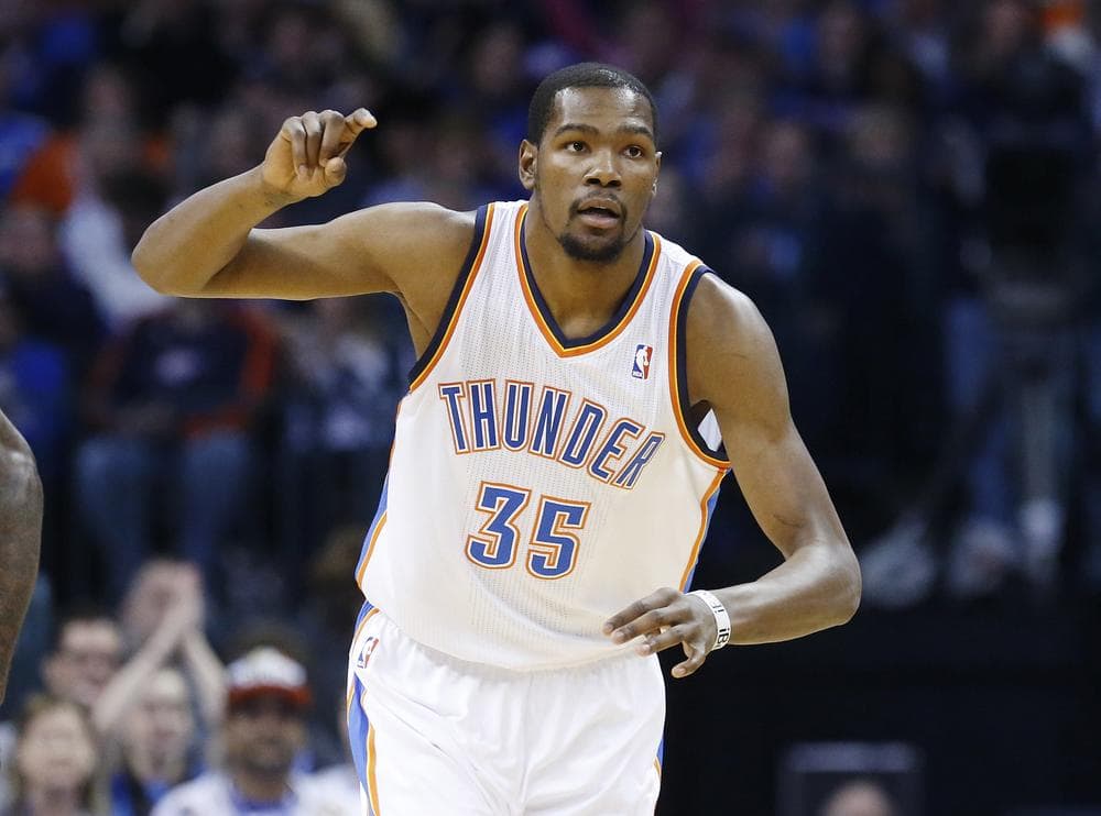 At the All-Star break, Kevin Durant and the Oklahoma City Thunder trail the San Antonio Spurs by 2.5 games in the Western Conference standings. (Sue Ogrocki/AP)