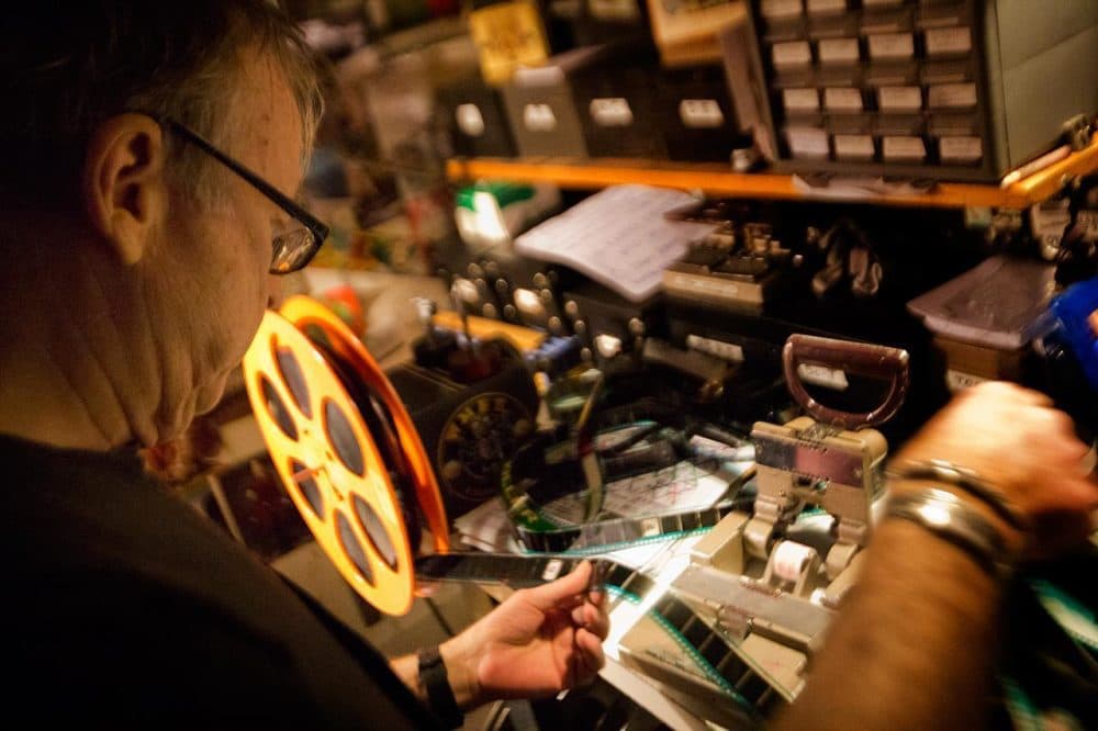 Brattle Theatre Projectionist Dave Leamon prepares a reel. (Jesse Costa/WBUR)