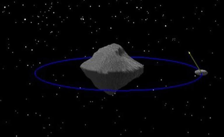 A rendering of Didymos with its moon. (European Space Agency)