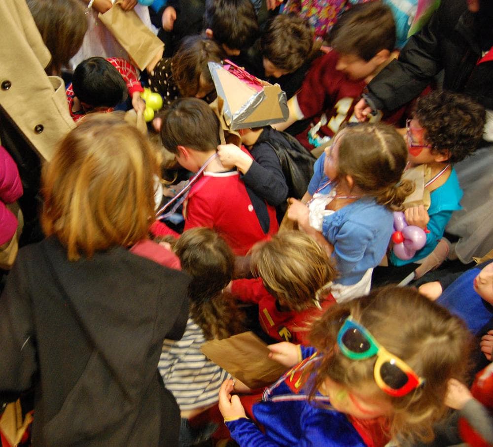 Scrambling to get the candy that spilled out of the Haman piñata. (Greg Cook)