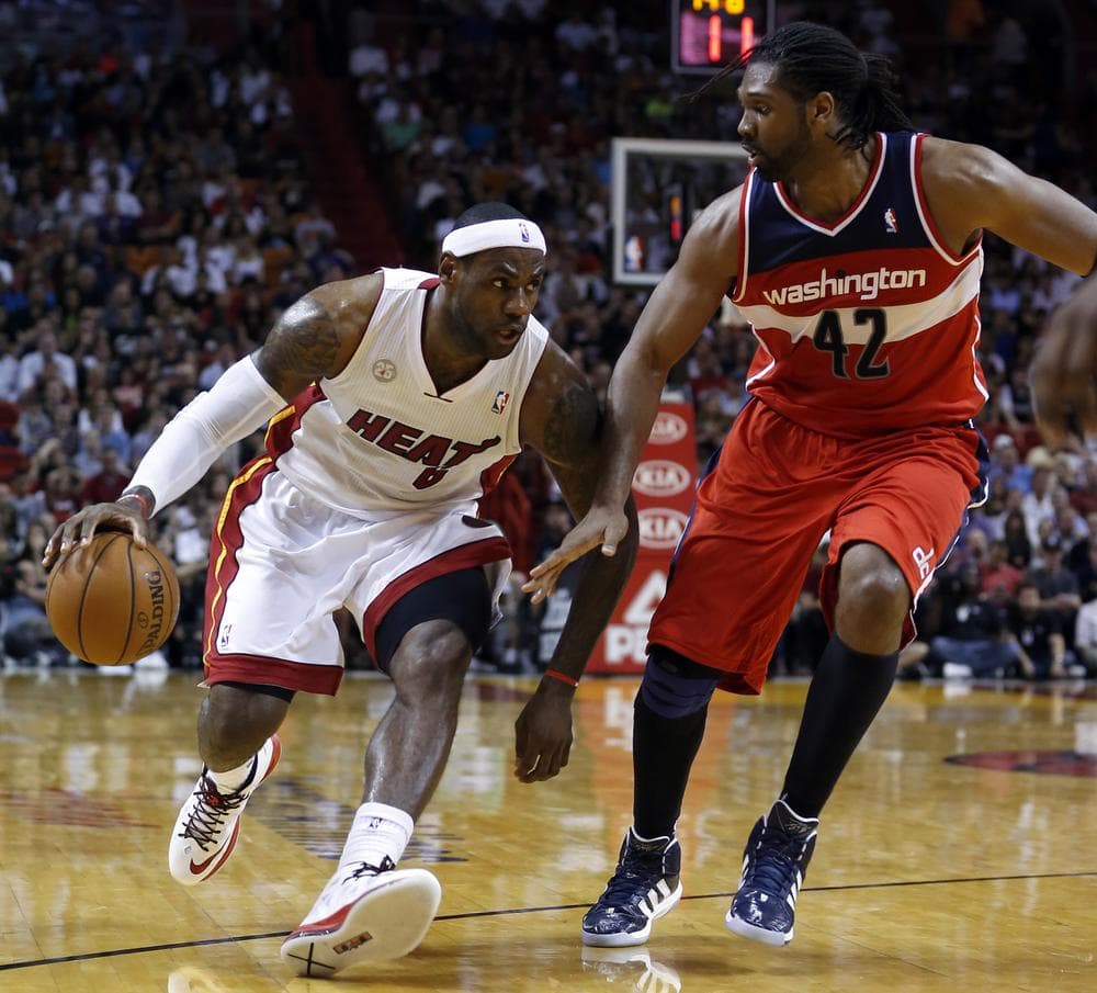 LeBron James has helped the Miami Heat take a commanding lead in the Eastern Conference standings. (Alan Diaz/AP)