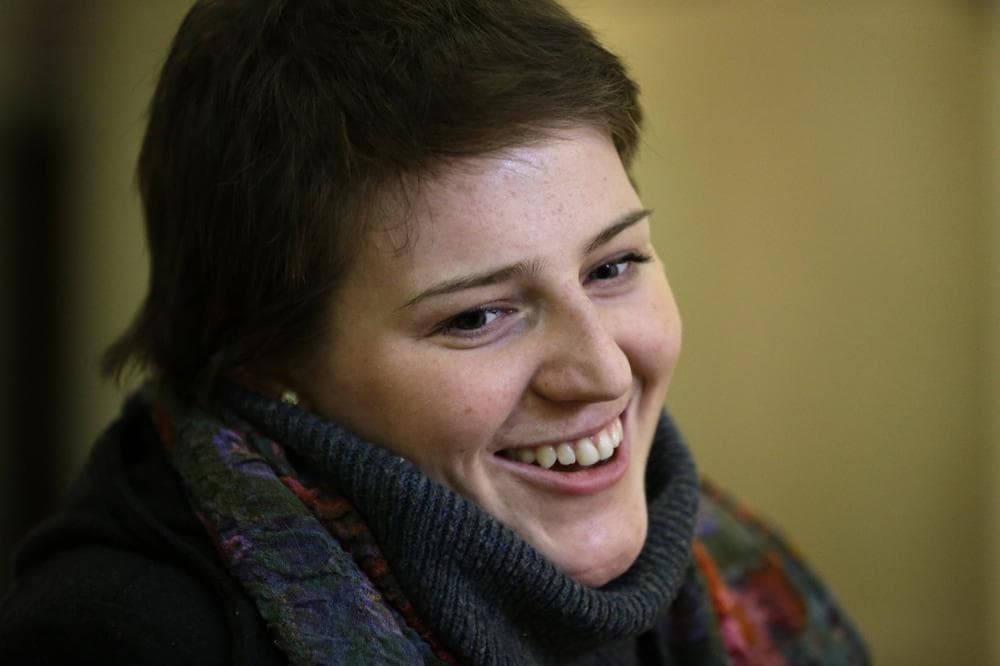 In this Wednesday, Jan. 16, 2013 photo, Meg Theriault, of Salisbury, Mass., reflects on being back in class on the first day of spring semester 2013 at Boston University School of Management, in Boston. (Steven Senne/AP)