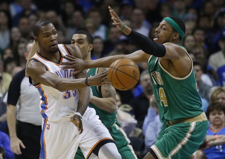 Oklahoma City Thunder forward Kevin Durant (35) passes in front of Boston Celtics forward Paul Pierce (34). (AP/Sue Ogrocki)