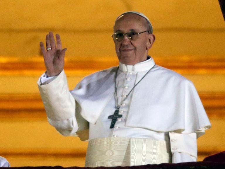 Pope Francis waves to the crowd from the central balcony of St. Peter's Basilica at the Vatican. (Gregorio Borgia/AP)