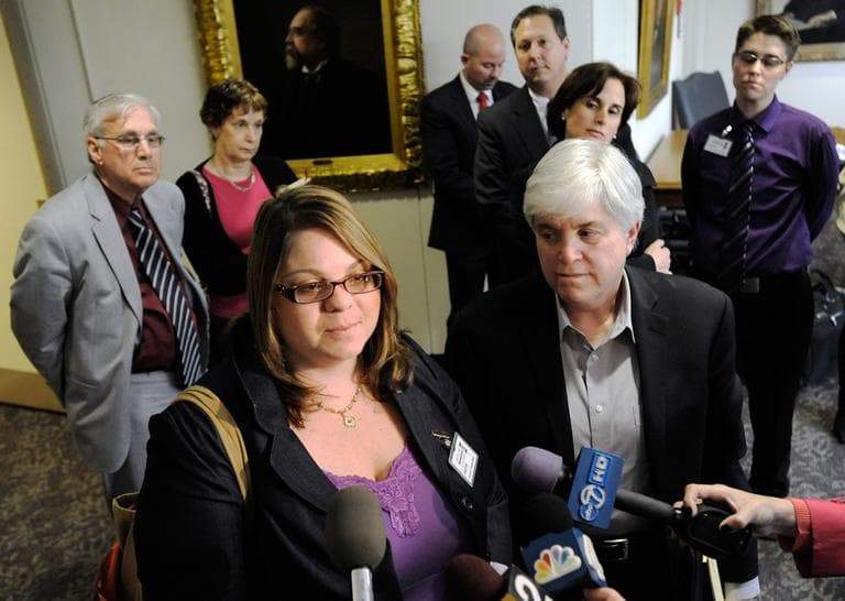 Jessica Port, front left, and her attorney Michele Zavos, front right, speak to reporters after the Court of Appeals of Maryland heard her case for divorce from her wife, Virginia Anne Cowan, back right, Friday, April 6, 2012, in Annapolis, Md. The couple married in California but were denied a divorce in Maryland. (Steve Ruark/AP)
