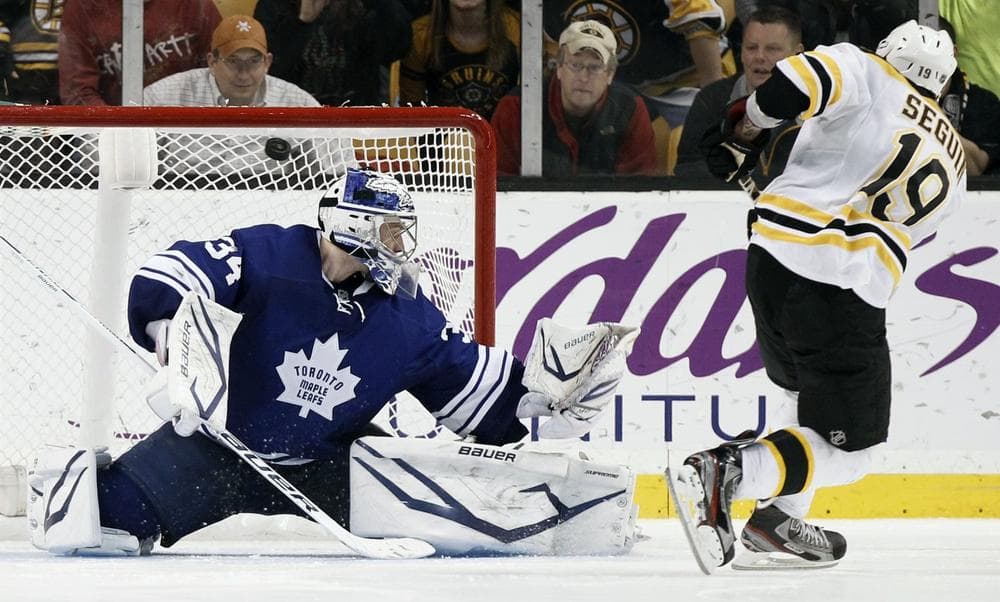 Tyler Seguin scores on Maple Leafs goalie James Reimer during the shootout in Boston's 3-2 win. (AP)
