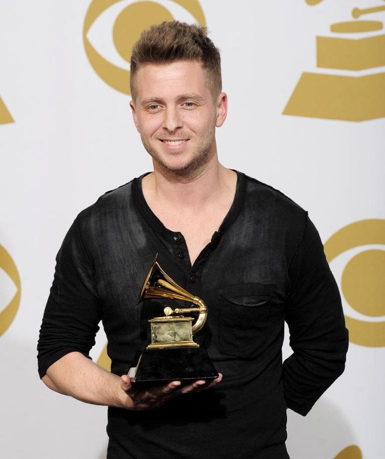 Ryan Tedder poses backstage with the award for album of the year for Adele's "21" at the 54th annual Grammy Awards on Feb. 12, 2012 in Los Angeles. (Mark J. Terrill/AP)