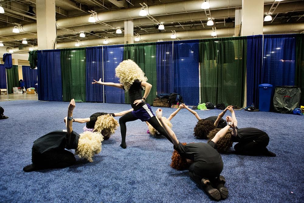 12-13 year olds from the Celtic Steps Academy from Colorado rehearsing their dance routine before going on stage. (JesseCosta/WBUR)