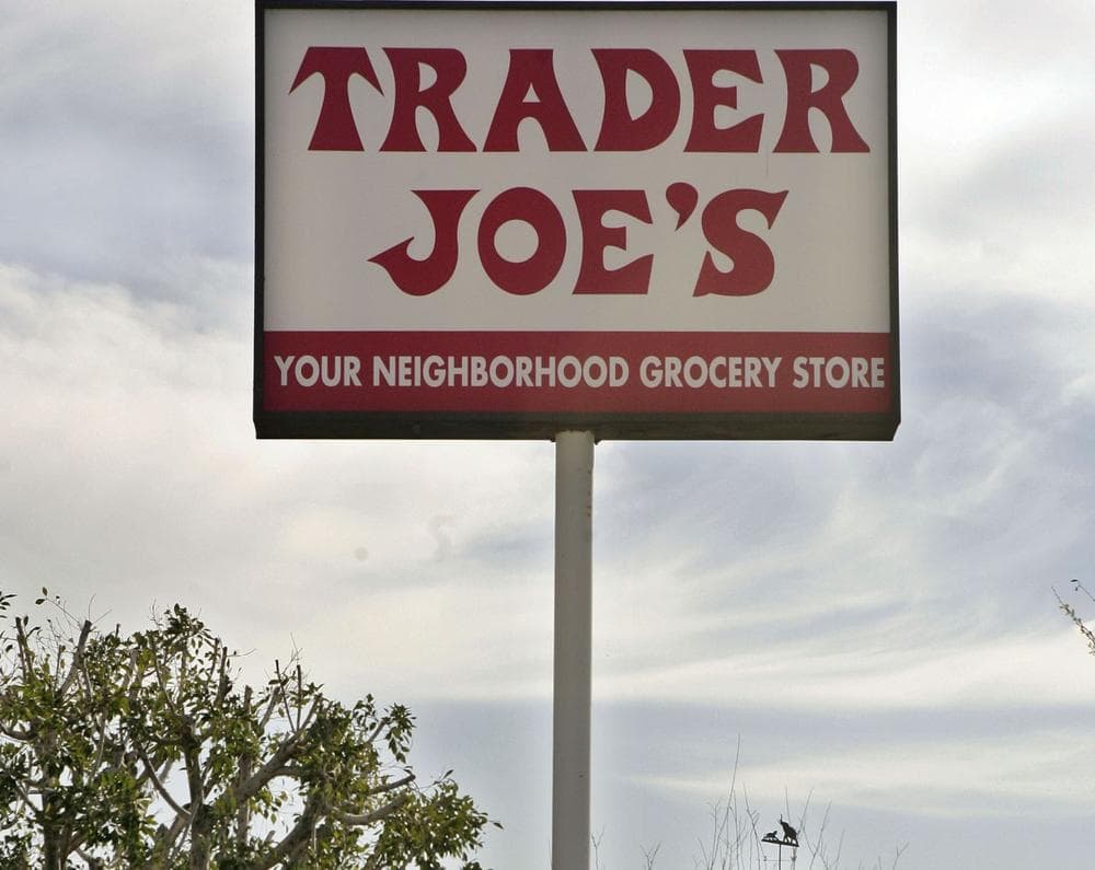 In this Feb. 11, 2008 file photo, a customer departs Trader Joe's in Los Angeles. (AP Photos/Ric Francis, File)
