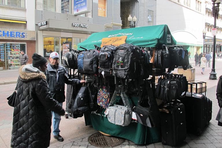 Craig Kaplan is one of many push-cart vendors at Downtown Crossing. (Ava Aguado/WBUR)