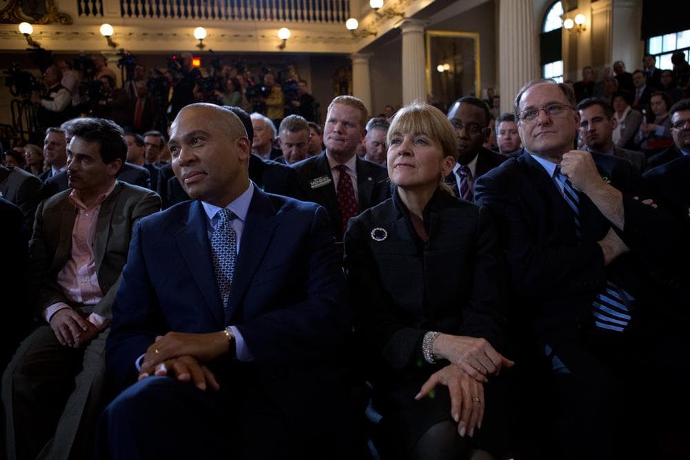 Gov. Deval Patrick, Attorney General Martha Coakley and U.S. Rep. Michael Capuano watch as Menino gives his farewell address Thursday. (Jesse Costa/WBUR)