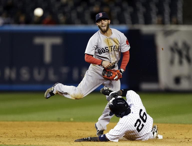 Dustin Pedroia throws to first after New York Yankees' Francisco Cervelli, not shown, grounded out.  (AP)